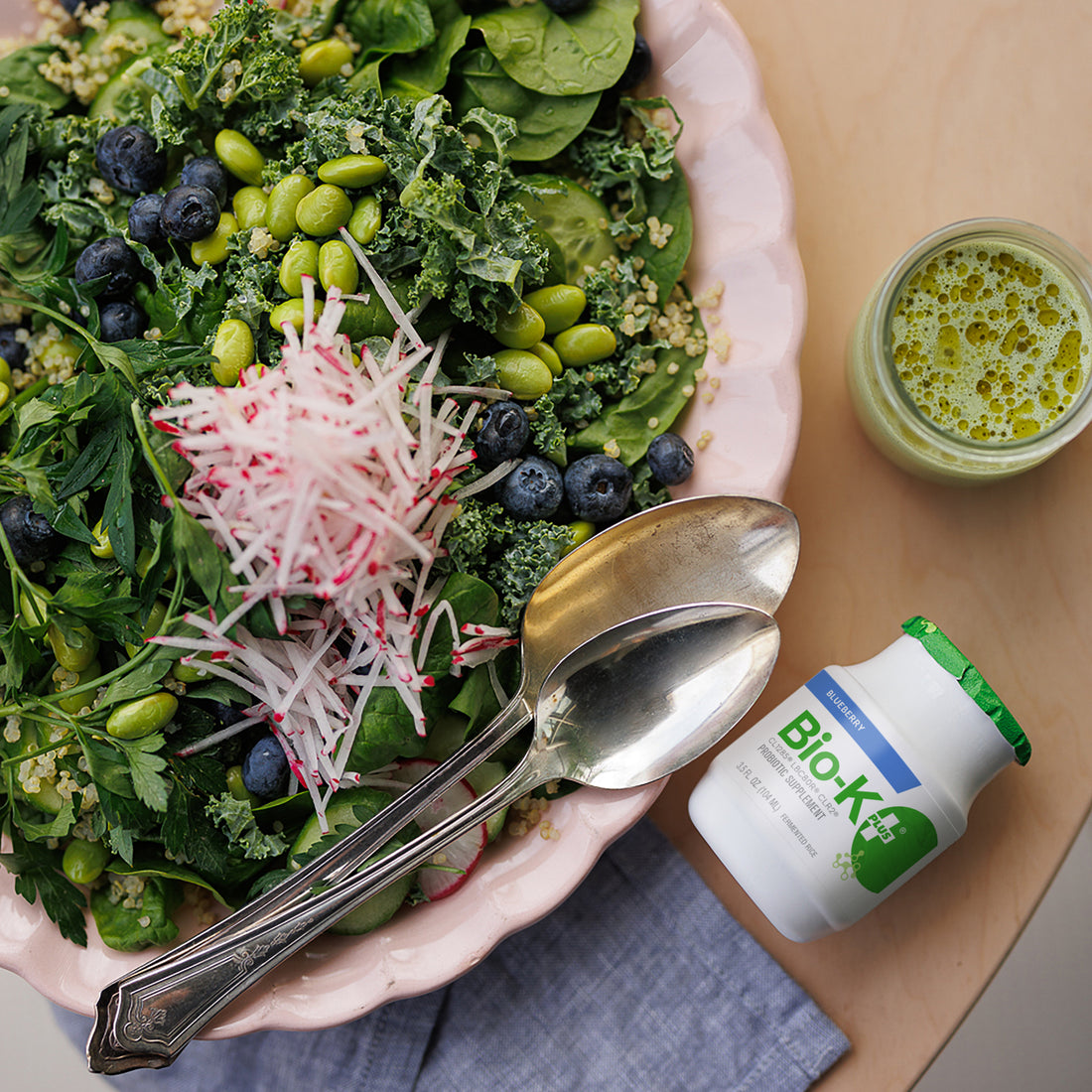 Summer salad with a Bio-K+ bottle
